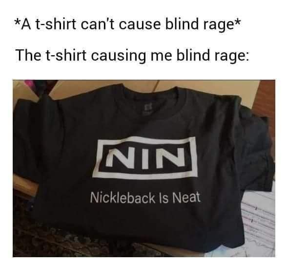 A black t-shirt combining the Nine Inch Nails logo with text below reading "Nickleback Is Neat," designed to irritate rock music fans.
