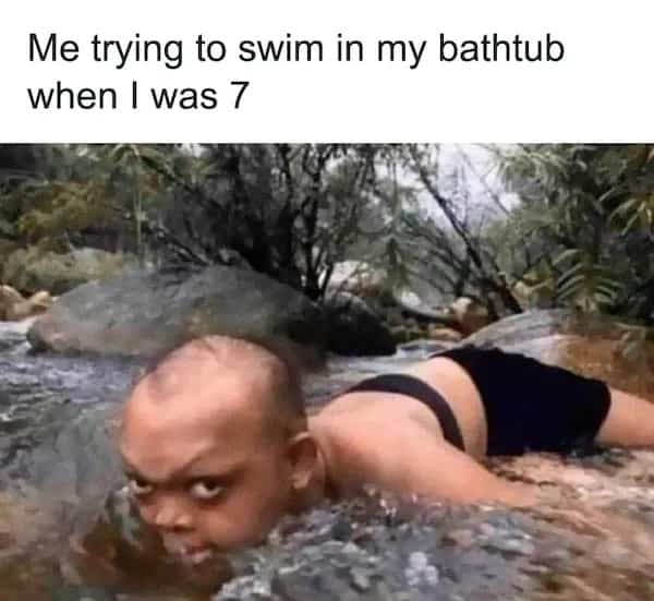 Funny meme showing person wading shallow water with text about swimming in a bathtub.