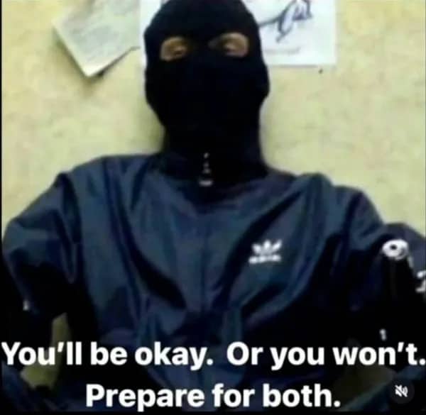 Person wearing black balaclava and jacket with text about preparing for good or bad outcomes.
