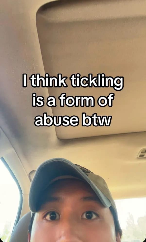 Person looking up inside a car with text saying tickling is abuse funny memes.