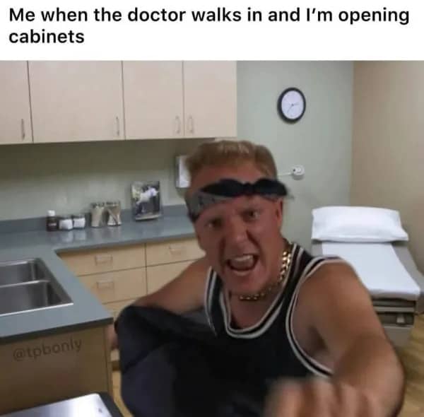 J-Roc from Trailer Park Boys reacting aggressively inside a doctor's medical examination office.