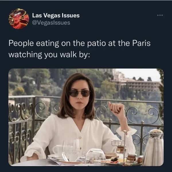 Aubrey Plaza looking unamused on a outdoor restaurant patio meme about Paris patio spectators watching passersby.