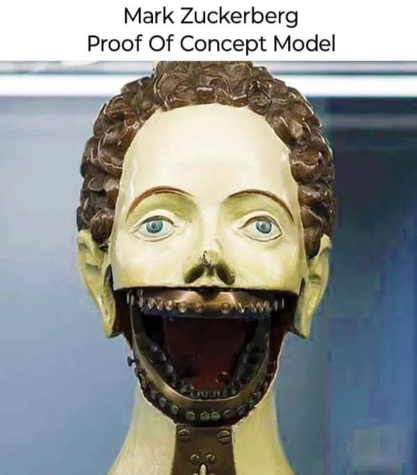Creepy mechanical medical mannequin head with wide open jaw labeled as Mark Zuckerberg model.