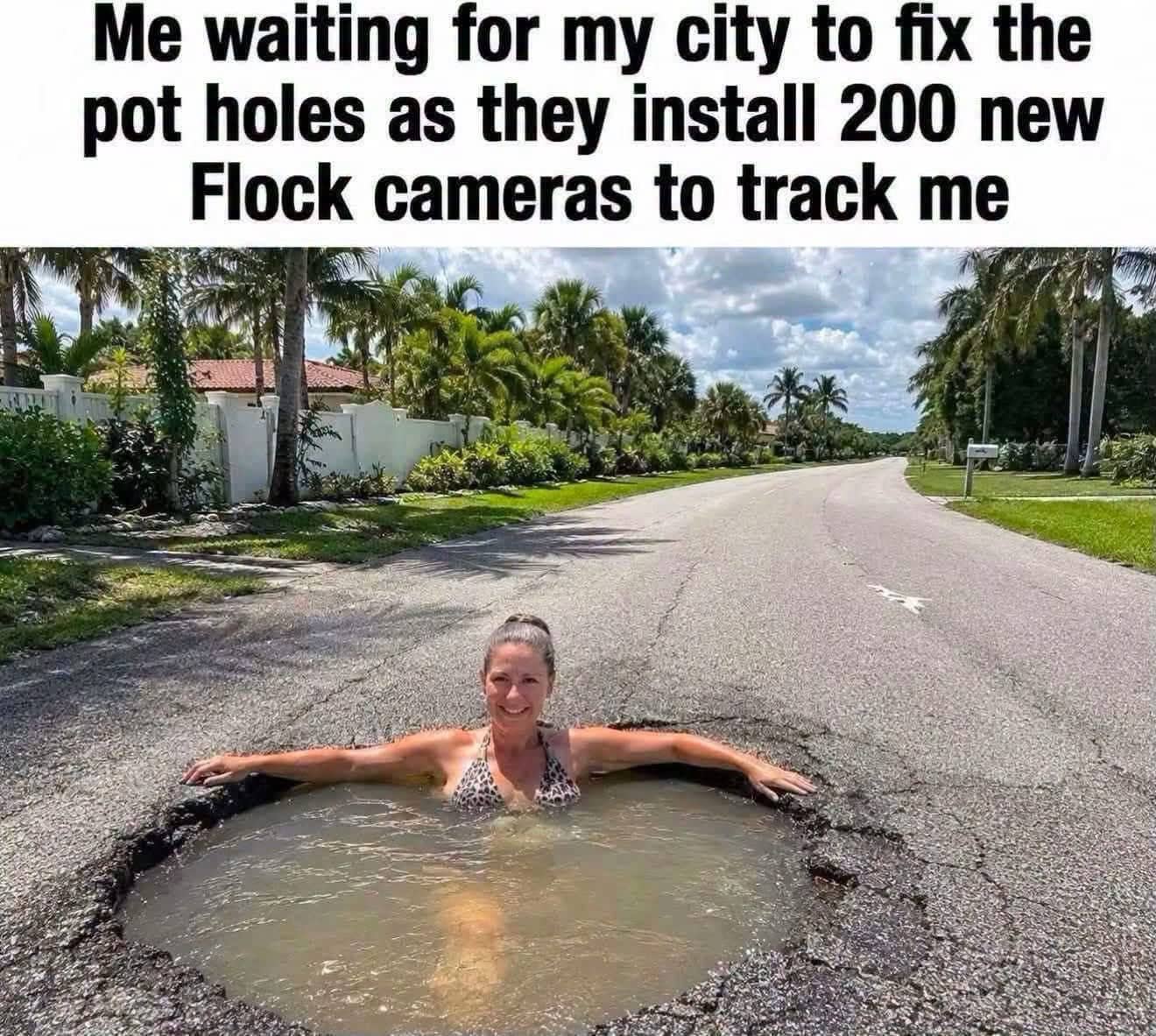 Woman relaxing in flooded pothole while city installs surveillance cameras funny meme.
