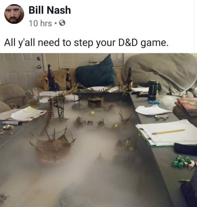 Elaborate Dungeons and Dragons tabletop game setup featuring realistic smoke machine fog and miniatures.