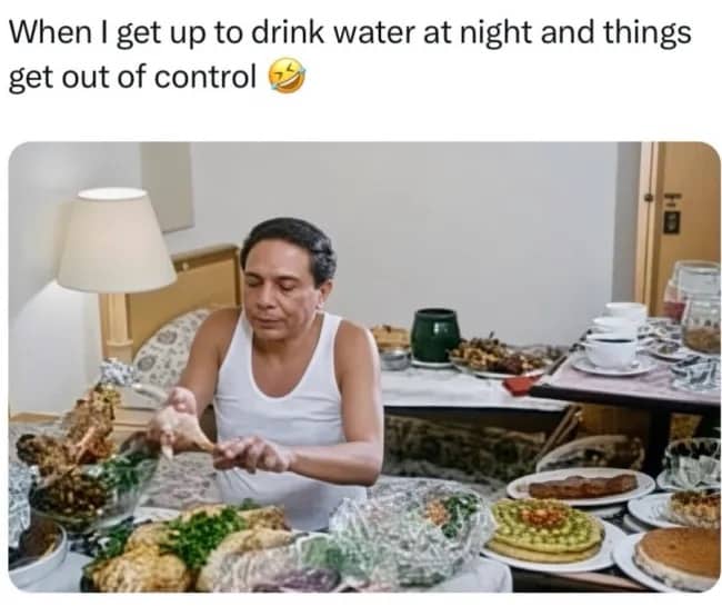 Man sitting before a massive feast meme representing late night kitchen snack craving escalations.