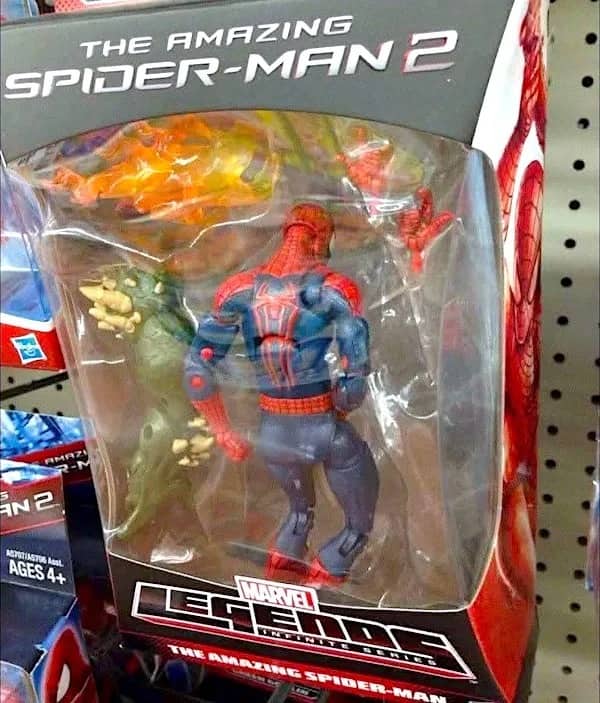 Defective Spider-Man action figure packaged upside down with twisted backwards legs funny meme.