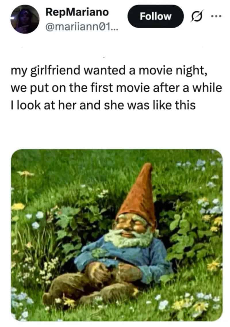 Social media post about a partner falling asleep immediately during movie night, represented by a classic sleeping garden gnome resting peacefully in a field of grass.