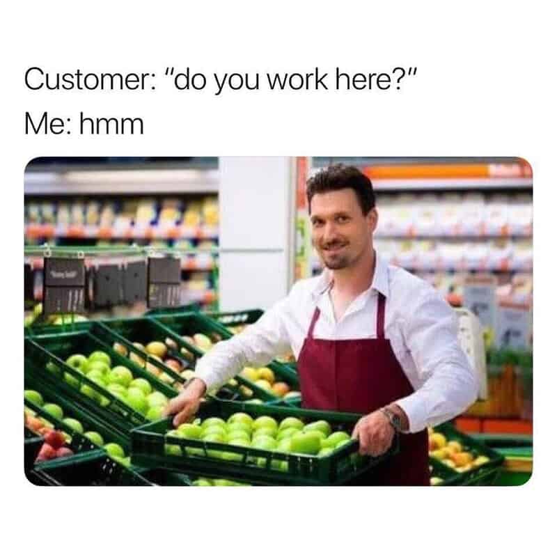 Grocery store employee holding produce crate responding to obvious questions in a retail meme.
