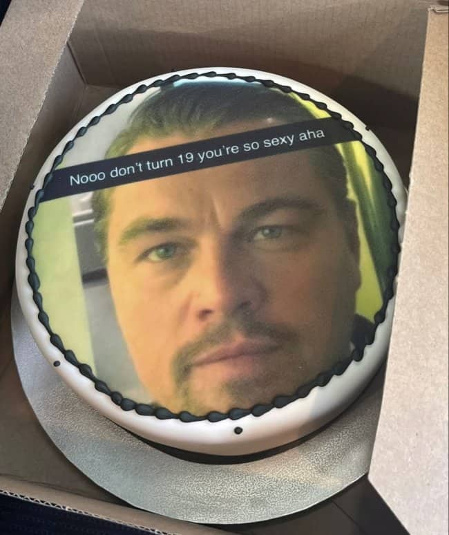 Hilarious meme cake showing Leonardo DiCaprio pleading with the birthday person not to turn nineteen.