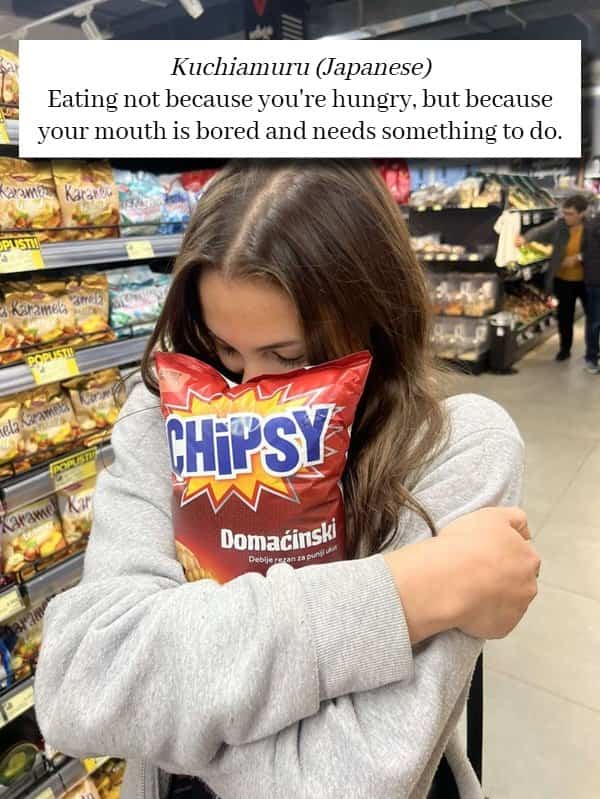 Woman hugging a potato chip bag illustrating the Japanese word Kuchiamuru for bored eating.
