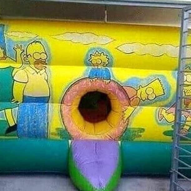 Simpsons themed bouncy castle with an awkwardly placed entrance hole representing the worst playgrounds.