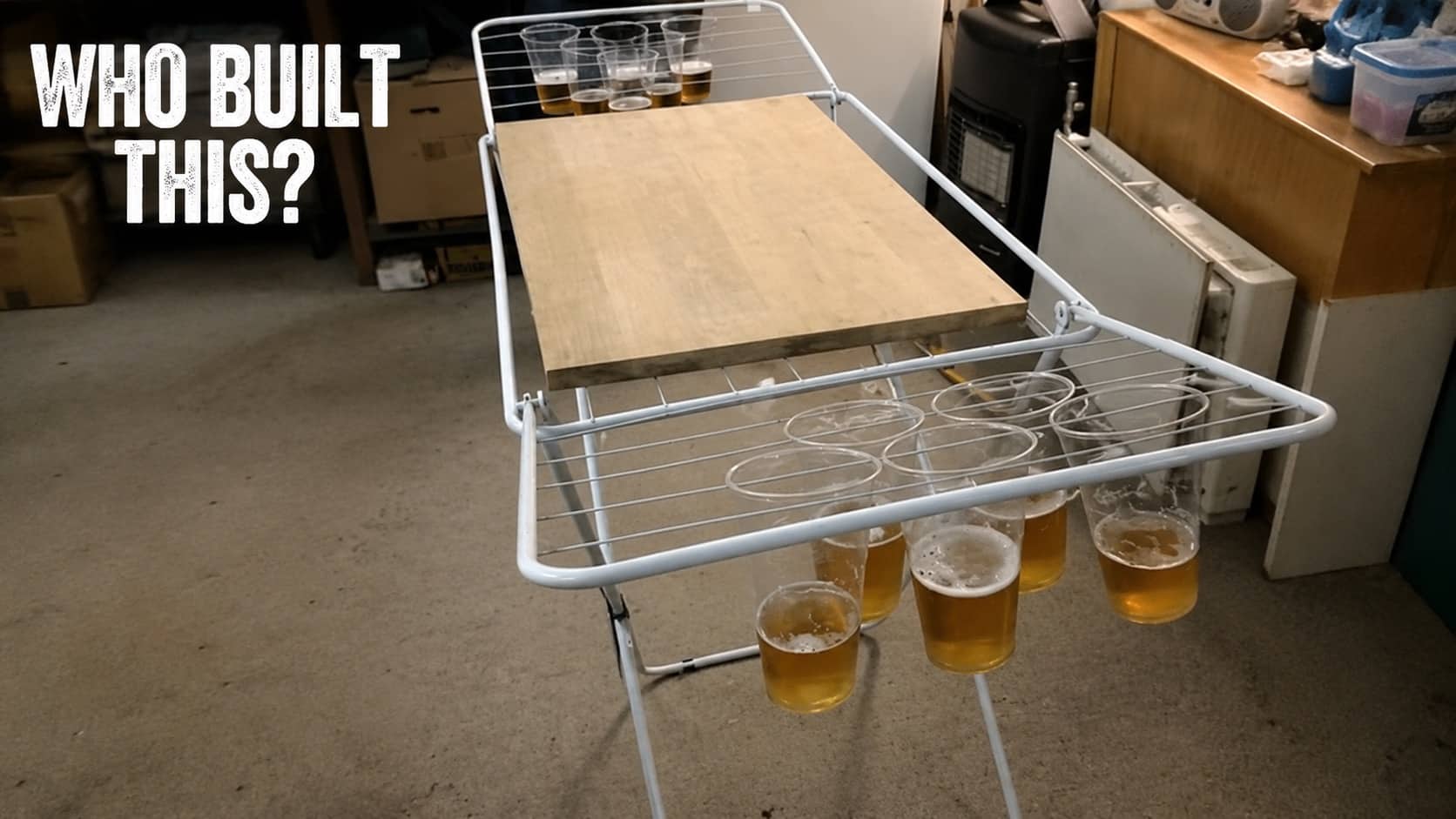 Homemade beer pong setup built on a clothes drying rack for funny drinking games.
