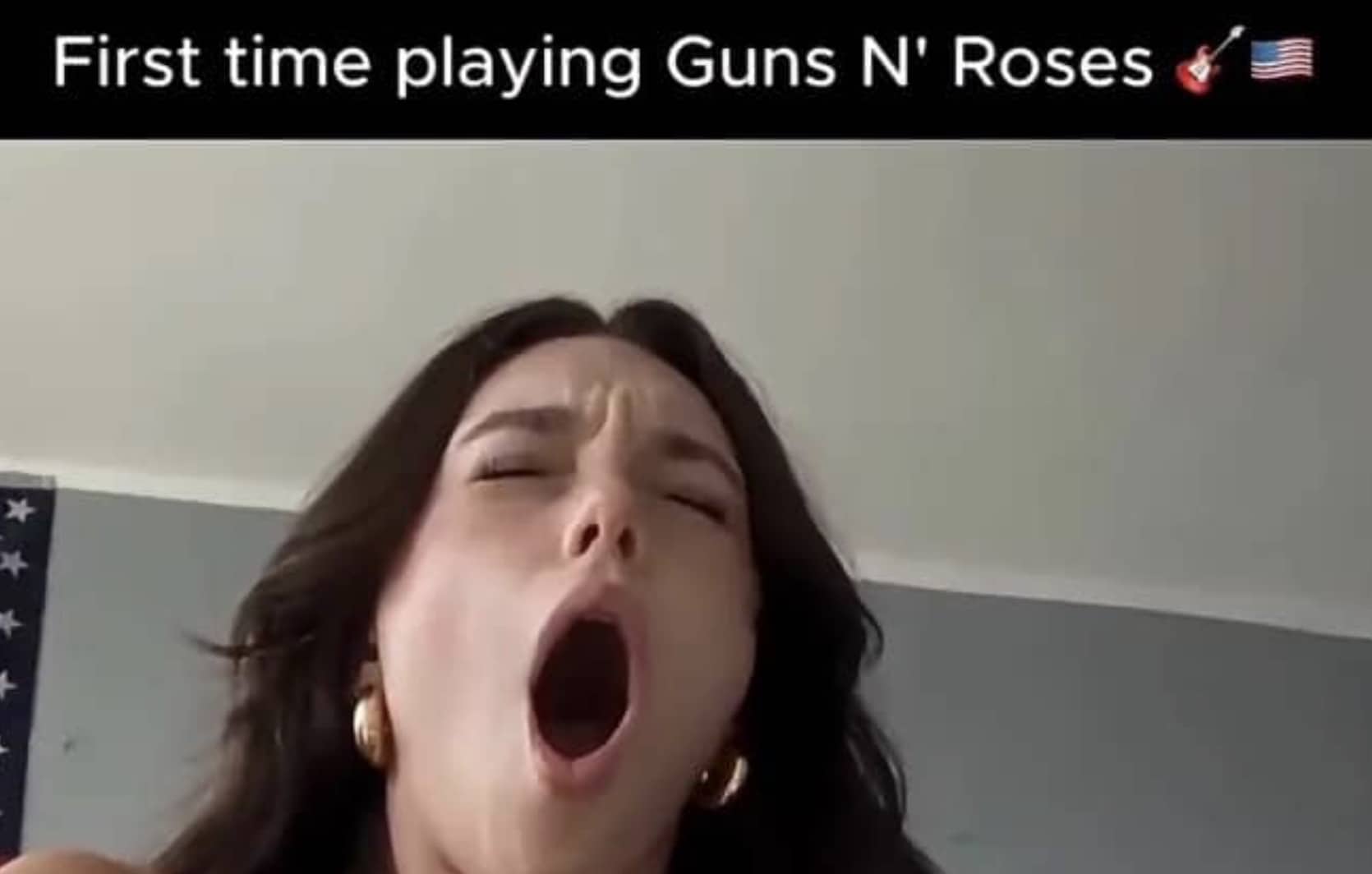 Funny meme showing a woman opening her mouth wide, reacting to playing Guns N' Roses music.
