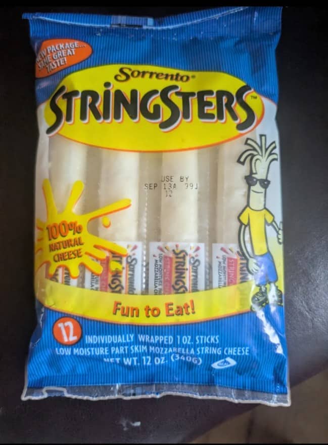 Retro package of Sorrento Stringsters mozzarella string cheese featuring cool cartoon cheese stick mascot.