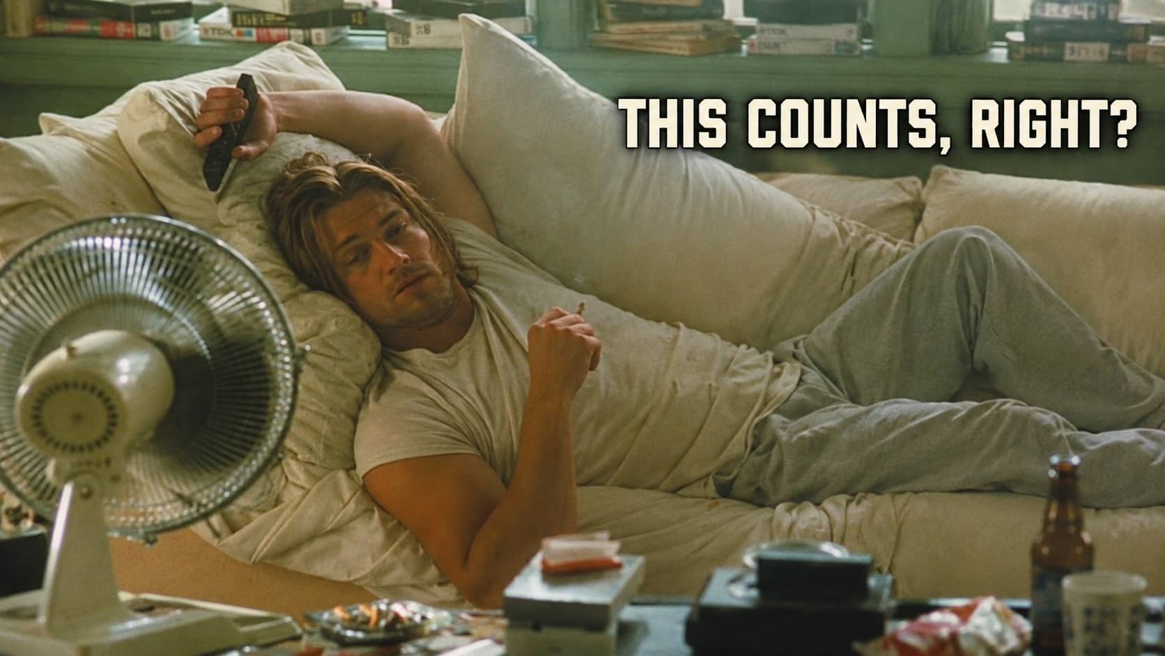 Man relaxing on couch watching TV illustration of lazy cheat codes for life.