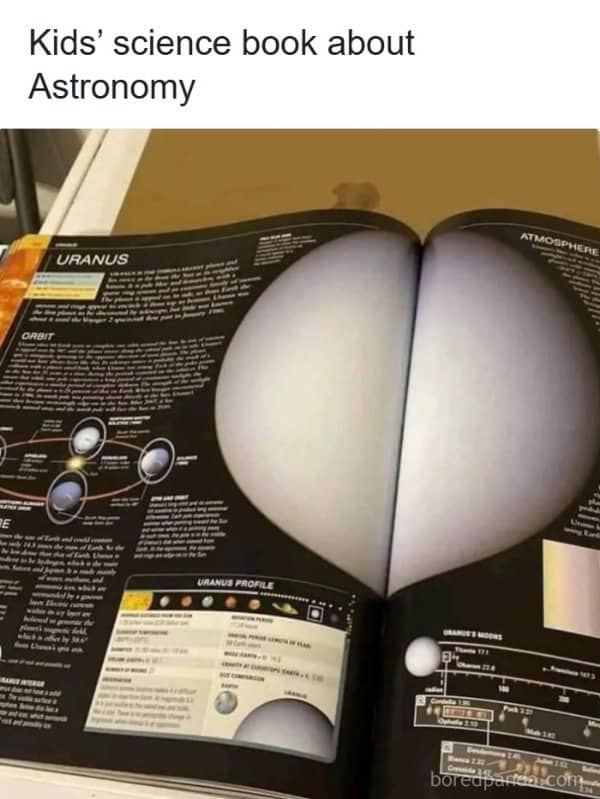 Kids astronomy book spread about Uranus falls across the page fold in unfortunate fashion.
