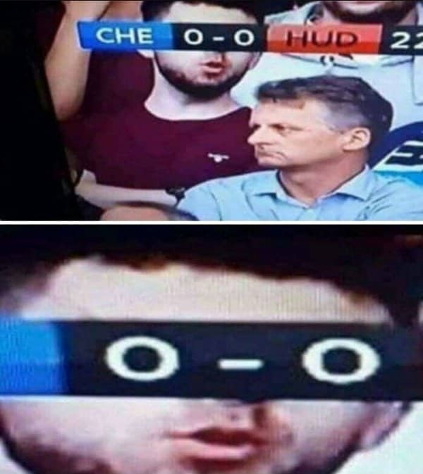 Football broadcast scoreline sits across a fan's face so the zeros become his eyes.