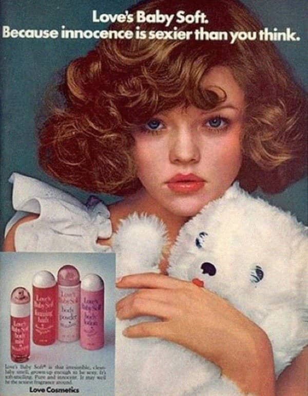 Love's Baby Soft fragrance ad showing a young woman holding a white teddy bear.