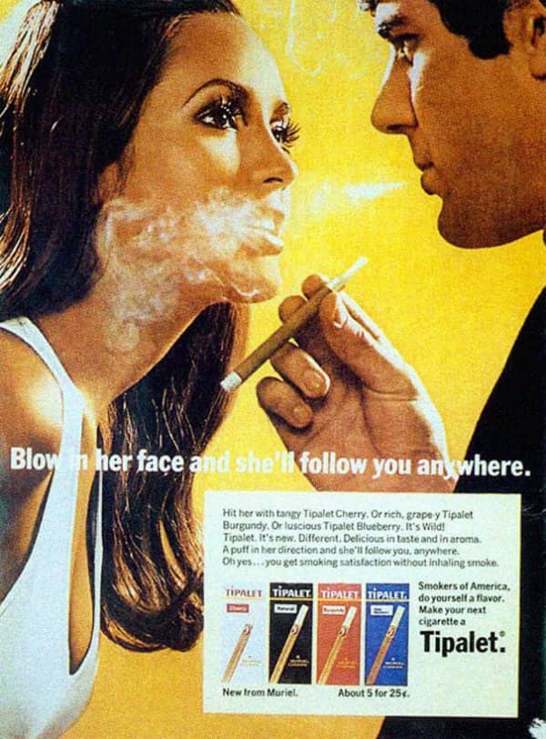 Tipalet cigarillo ad showing a man blowing smoke in a woman's face as romance.