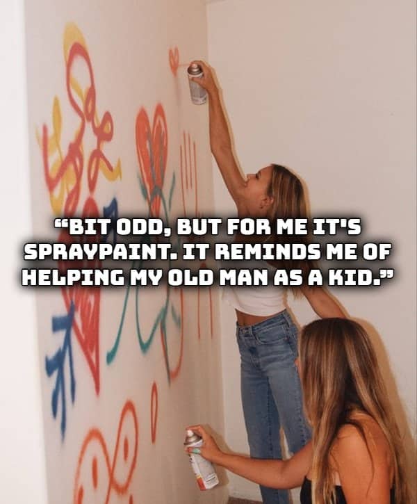 Two women spray painting a wall representing nostalgia for the distinct smell of spray paint.