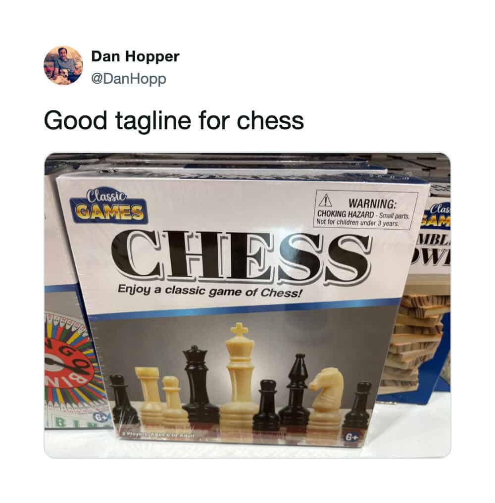 Boxed board game packaging displaying a choking hazard warning as an ironic tagline for a chess meme.