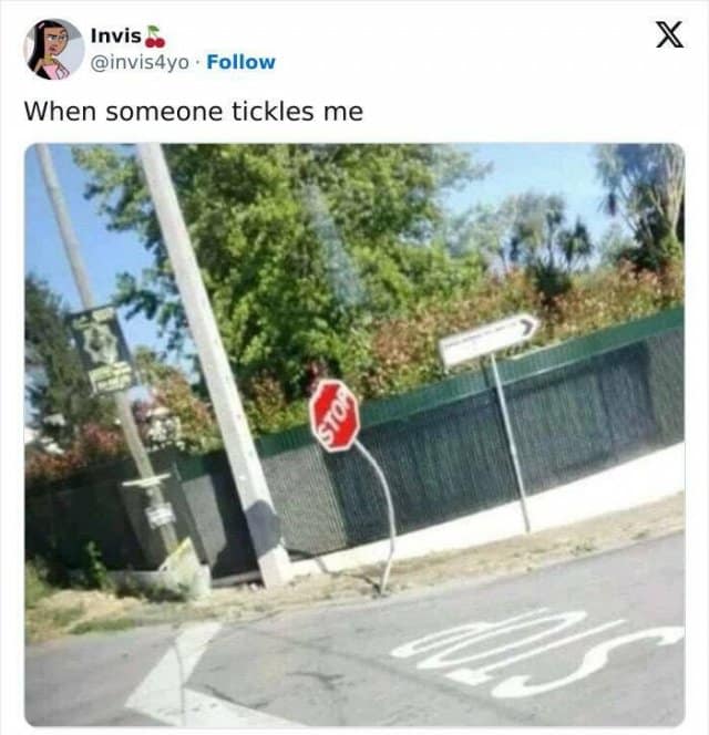 A viral tweet showing a strangely bent, wobbly STOP sign post along a roadside captioned as a physical reaction to being tickled.