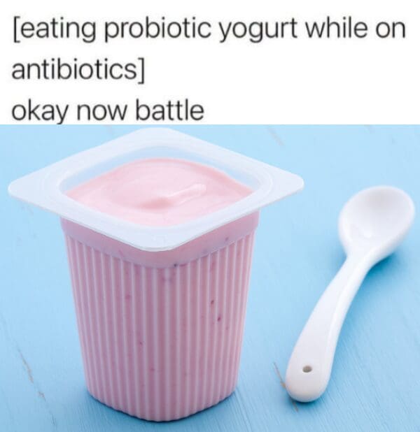 Photo of probiotic yogurt and a spoon captioned as a microscopic battle against oral antibiotics in a classic meme.