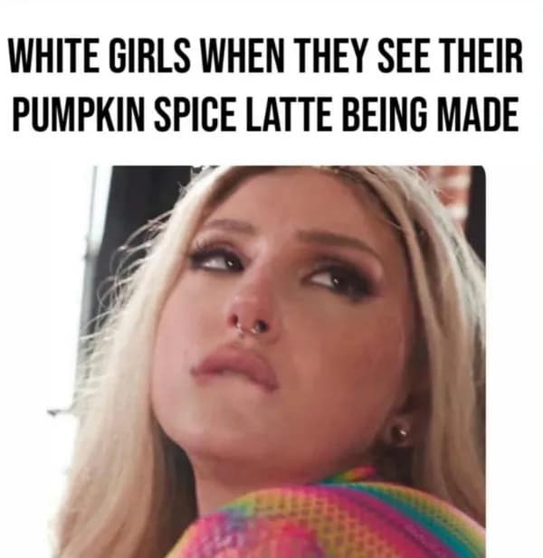 Close-up facial reaction of a blonde woman biting her lip eagerly, captioned about seeing a pumpkin spice latte being crafted in a classic meme.