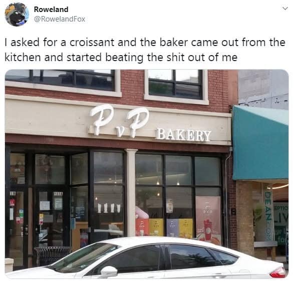 Storefront photo of "PvP BAKERY" paired with a tweet joking that asking for a croissant resulted in getting attacked by the baker in a classic meme.