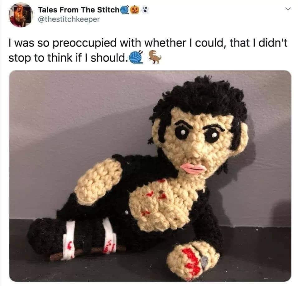 Crocheted plush doll of Jeff Goldblum reclining with an open shirt from Jurassic Park, paired with his famous movie quote as an old meme.
