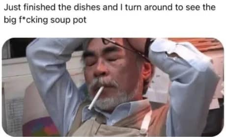Exhausted Hayao Miyazaki holding his head with a cigarette after discovering the giant dirty soup pot left after washing dishes in a classic meme.
