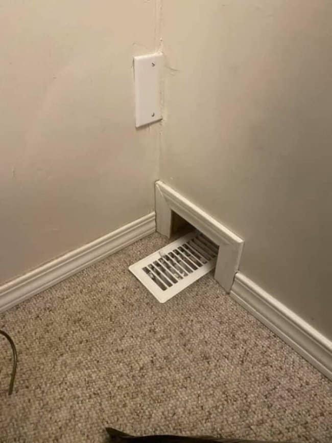 Construction fails begin with baseboard trim built around a floor vent, blocking it.