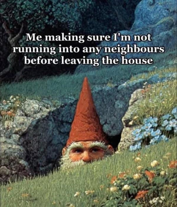 Red-hatted gnome cautiously peeking his eyes and nose above a grassy hill burrow to check for approaching neighbors in a fantasy meme.