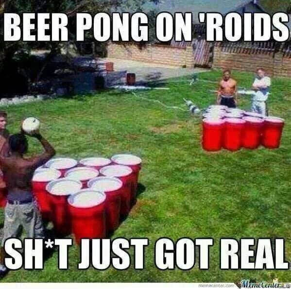 Backyard setup using giant red trash cans for an oversized funny drinking games meme.