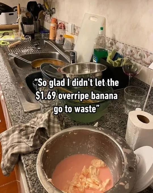 Messy kitchen sink filled with dirty dishes from baking banana bread funny meme.