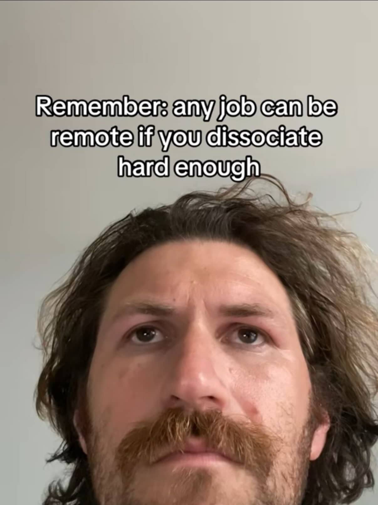 Relatable workplace humor meme about any job becoming remote through intense mental dissociation.