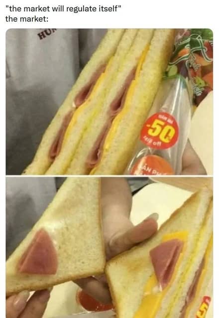 Free market economics meme showing sandwich with minimal ham slice hidden inside.