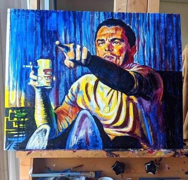 Colorful painting of Leonardo DiCaprio pointing meme holding a beer and cigarette.