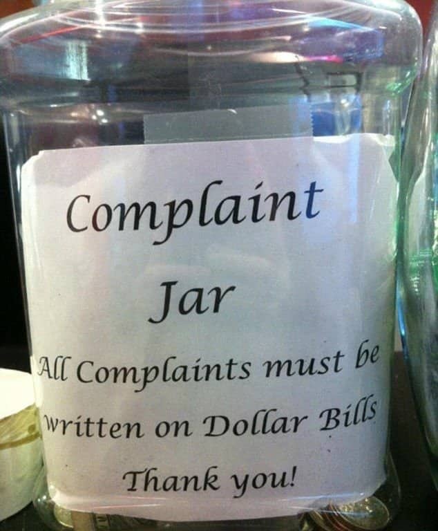 Clever funny tip jars labeled as a complaint department requiring grievances written on dollar bills.