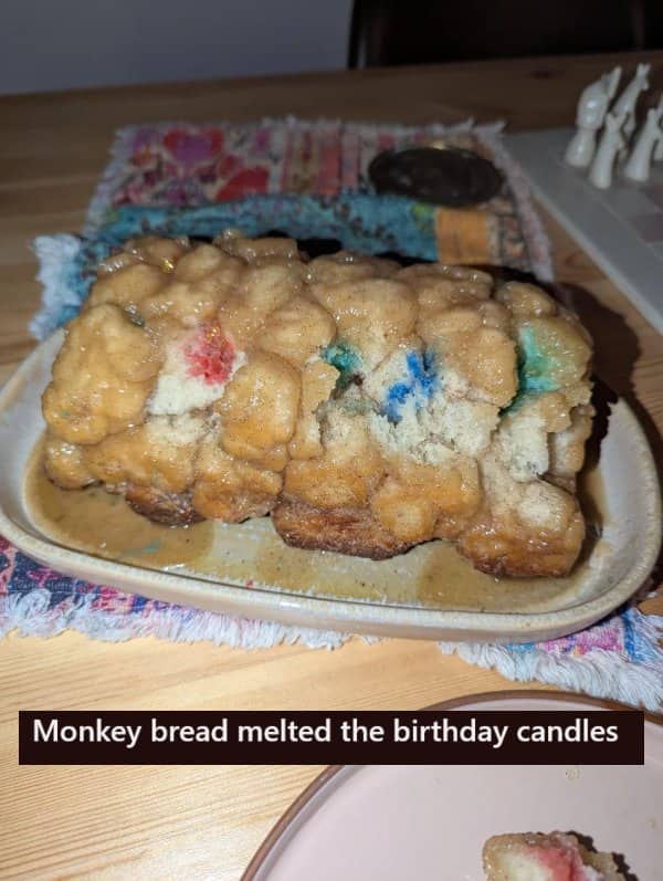 Monkey bread dessert that melted blue and pink plastic birthday candles on a bad day.