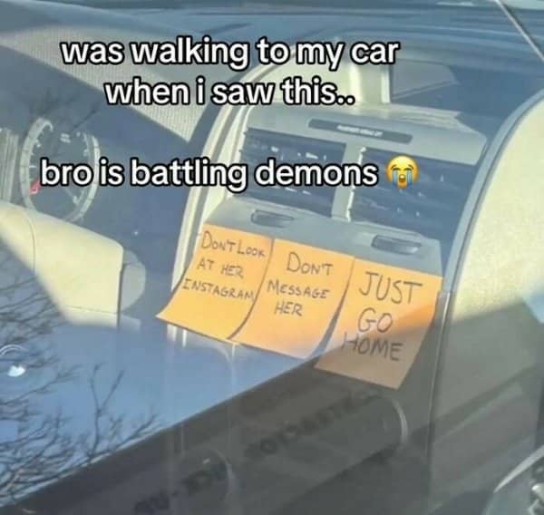 Sticky notes on a car dashboard tell the driver not to look her up or message.