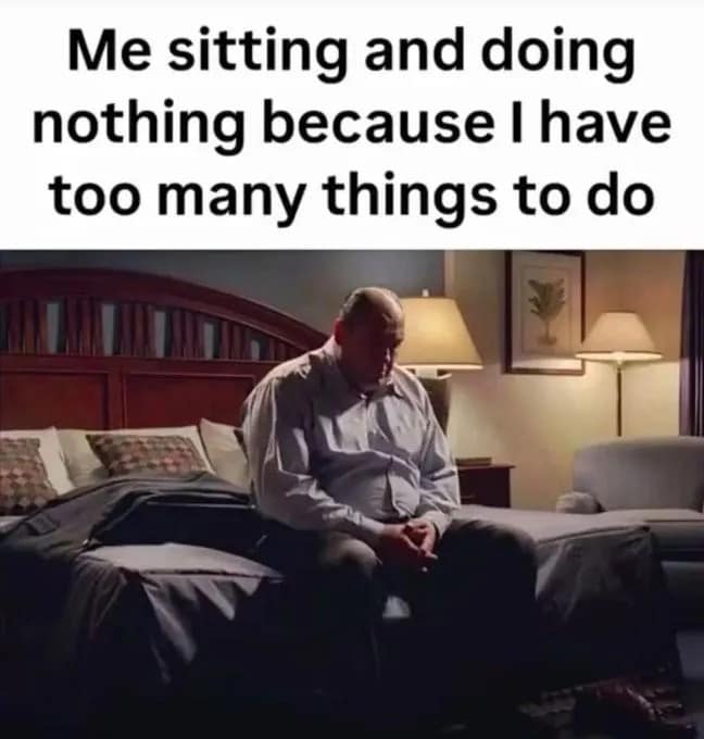Man sitting motionlessly on the edge of a bed overwhelmed by an endless to-do list in a meme dump.