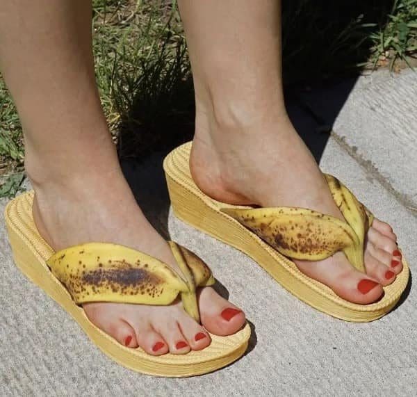Wedge flip flops shaped like spotted banana peels open this Saturday meme dump.