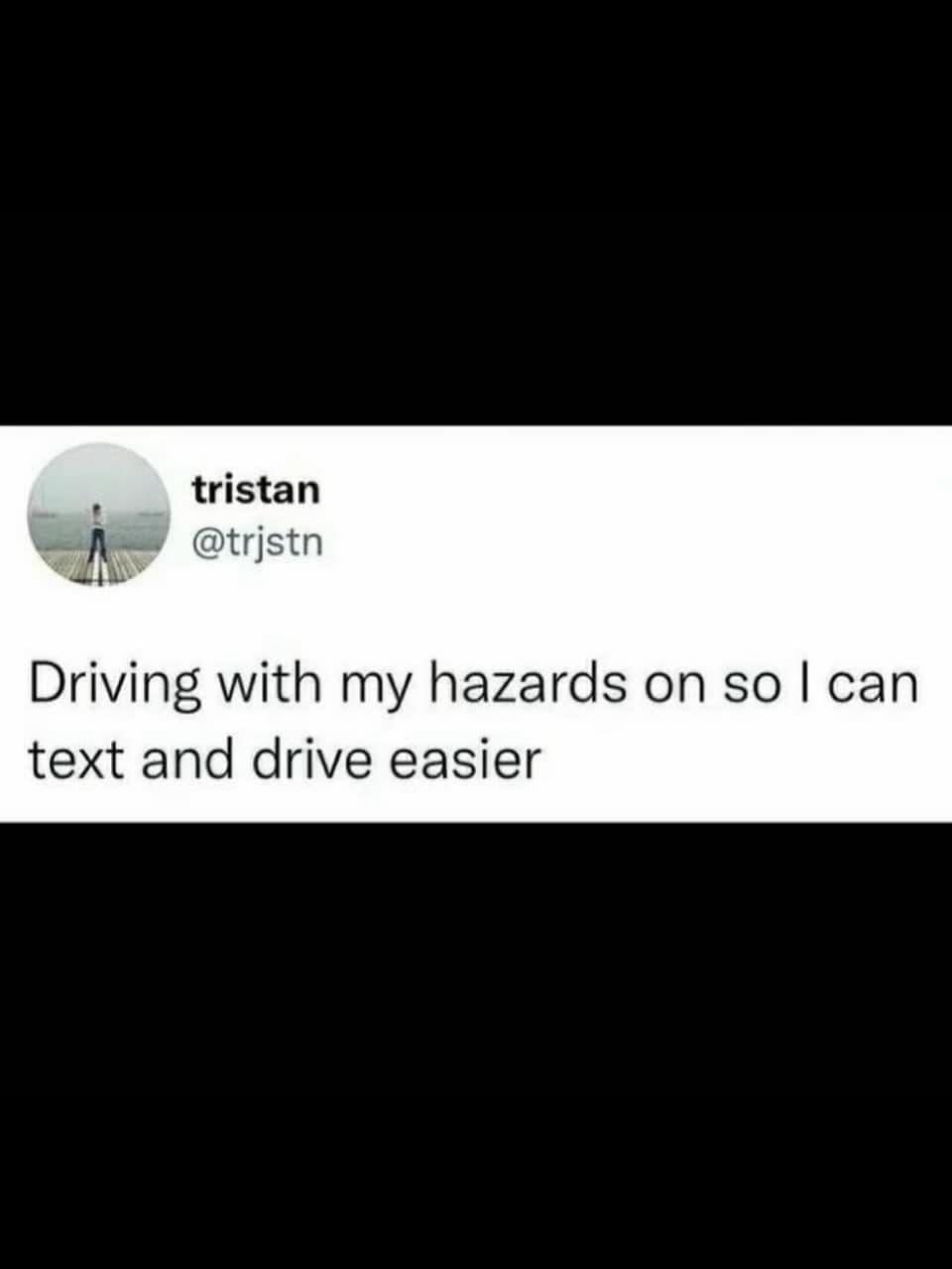 Tweet joking about driving with hazards on to make texting while driving easier.