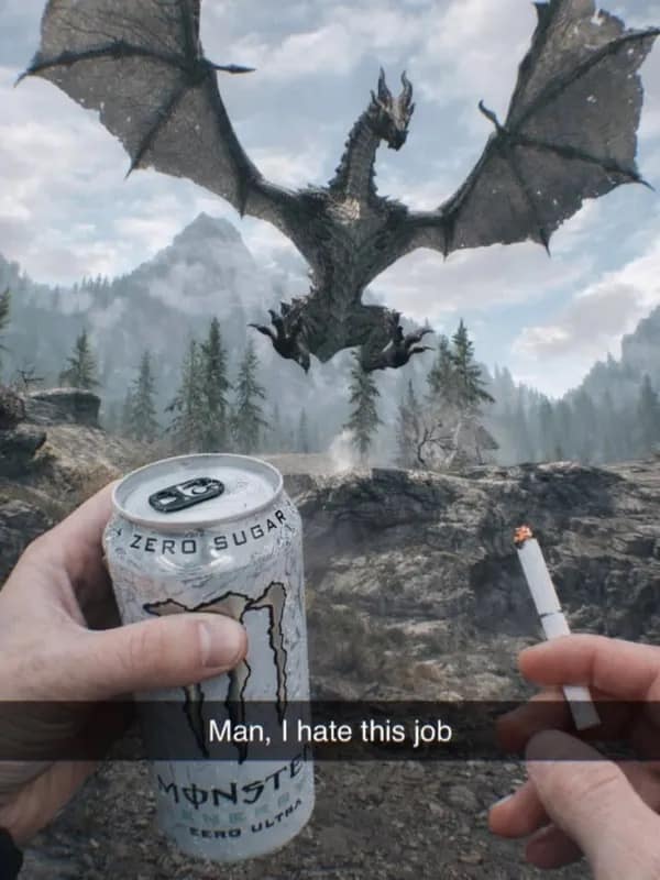 First-person perspective holding a white Monster Energy can and a cigarette while facing down an attacking Skyrim dragon, captioned 'Man, I hate this job' in a meme dump.