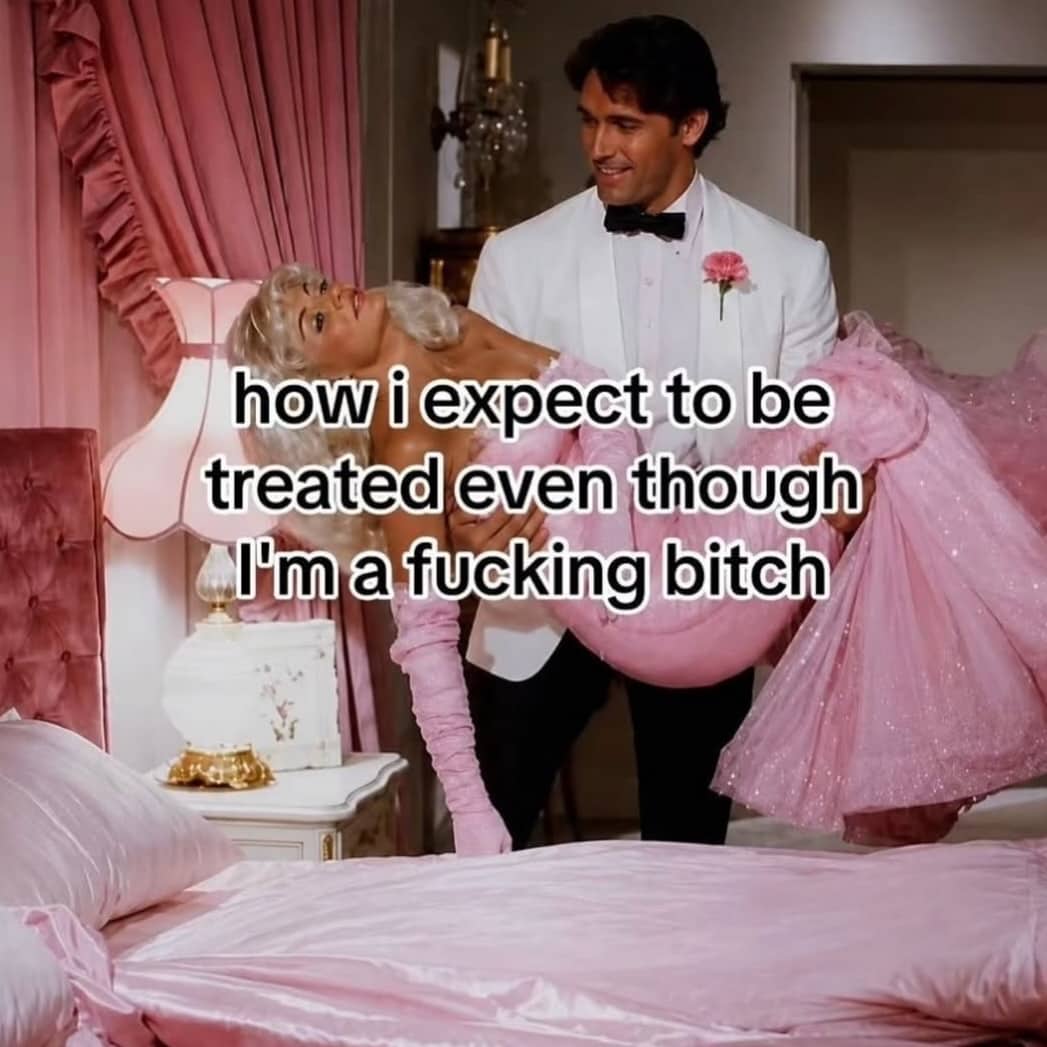 Classic movie scene of man carrying woman in pink dress funny relatable meme.