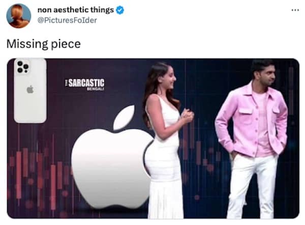 Woman standing in front of large Apple logo mimicking the missing piece bite mark shape.