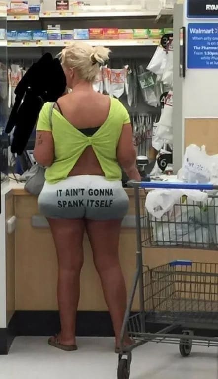 Woman in store wearing shorts with text it ain't gonna spank itself funny memes