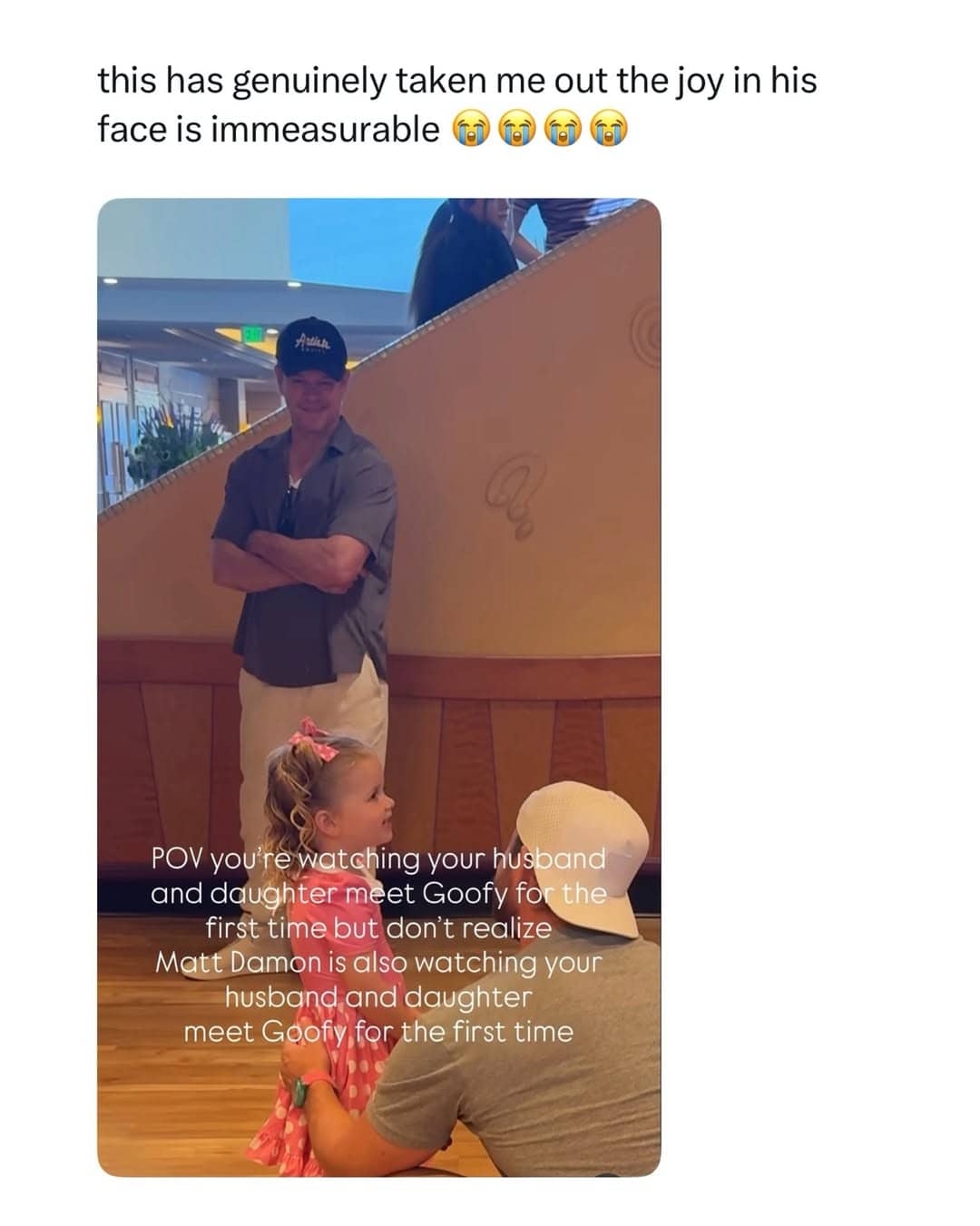 Funny meme showing actor Matt Damon unknowingly watching a family meet Goofy at Disney.